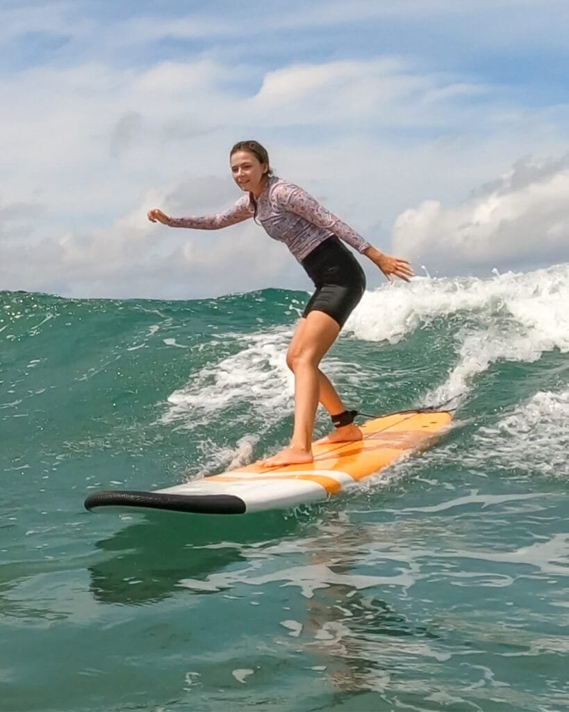 learn to surf at kuta beach