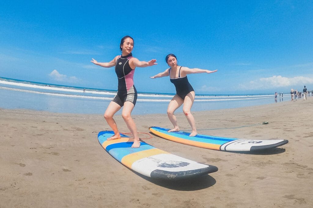 Important to warm up before your surf lesson Surf School Surfing Lessons in Bali Blog